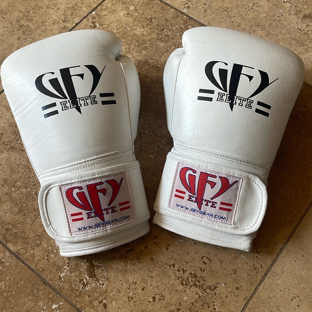 GFY Elite White training boxing gloves.
